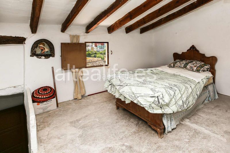 Foto ae08807c-d543-4ae0-9b4b-83c7a0a81932. Casa adossada amb xemeneia aparcament a Casco urbano Polop