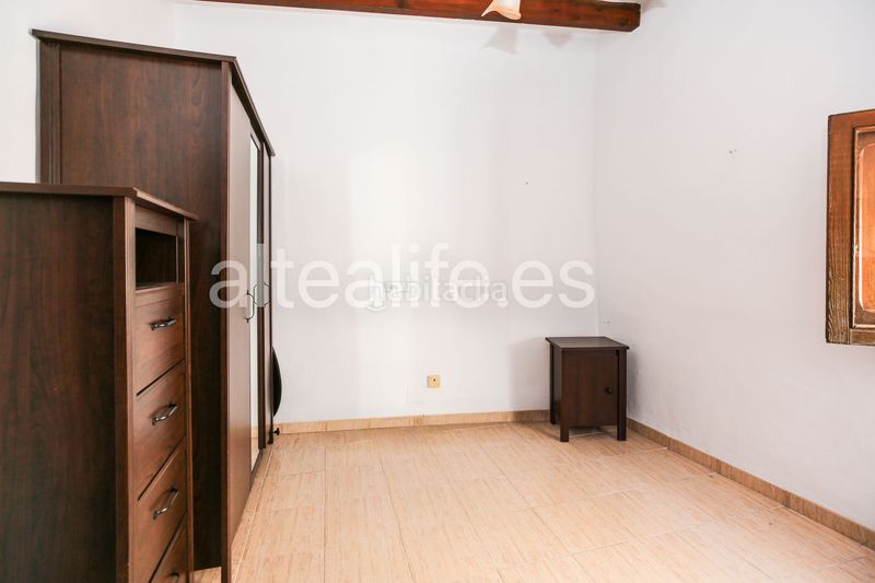 Foto f04f50cb-eb24-45b0-b5df-eb51505ea69b. Casa adossada amb xemeneia aparcament a Casco urbano Polop