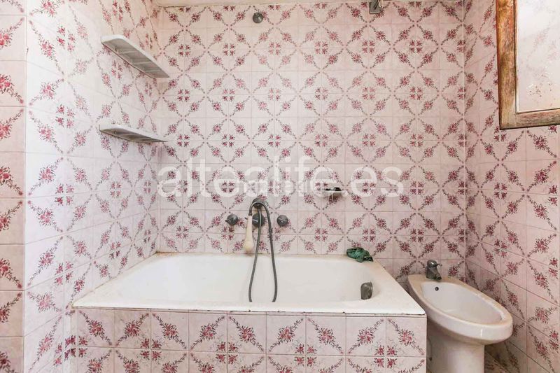 Foto 59156d98-bcec-4c41-8ee7-bd1feb3d44ef. Casa adossada amb xemeneia a Altea ciudad Altea