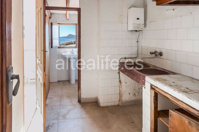 Foto c2fe8b50-4fcf-46d9-8664-070f0e03c6df. Casa adossada amb xemeneia a Altea ciudad Altea