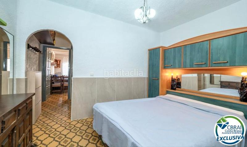 Foto 284c88c4-ce20-43e1-a9ce-53a6dc0ddebb. Piso en carrer poblat típic-gregal 3 apartamento de dos dormitorios, aparcamiento privado y licencia turística. en Empuriabrava