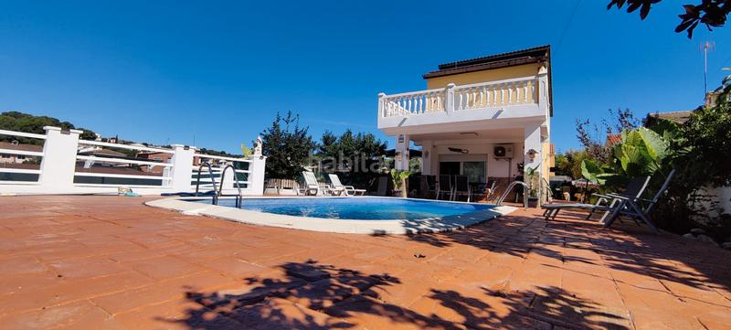 Foto 53374a6c-797c-45ec-9fb1-0ec1971692a0. Chalet with fireplace heating parking pool in costa Cunit - els jardins - els rosers Cunit