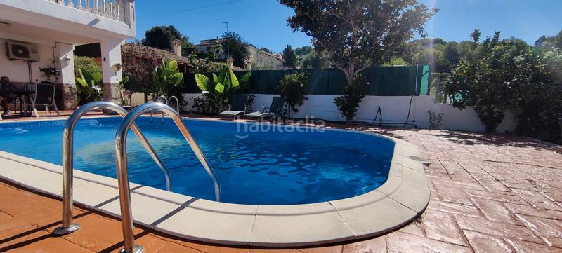 Foto 7eb66f9d-69c3-41cd-ae48-547efaf76993. Chalet with fireplace heating parking pool in costa Cunit - els jardins - els rosers Cunit