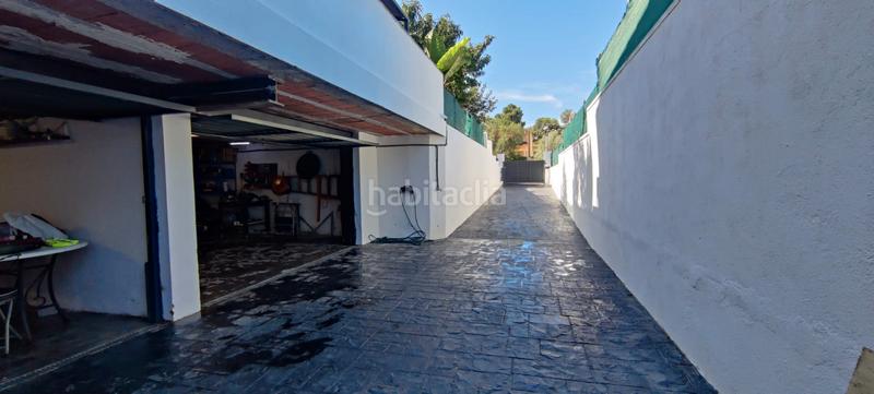 Foto 90253300-a9df-496a-988c-ea0a892e4aa7. Chalet with fireplace heating parking pool in costa Cunit - els jardins - els rosers Cunit