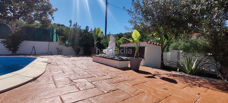 Foto 9a4e4a9b-65eb-41f4-885e-b67253dec619. Chalet with fireplace heating parking pool in costa Cunit - els jardins - els rosers Cunit