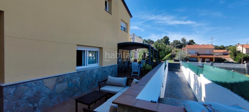 Foto cbea5335-a58e-403c-a623-388dbb3fdff0. Chalet with fireplace heating parking pool in costa Cunit - els jardins - els rosers Cunit