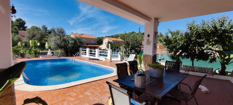 Foto d7f911c9-5f56-4fad-9aca-ebbd13bbda24. Chalet with fireplace heating parking pool in costa Cunit - els jardins - els rosers Cunit