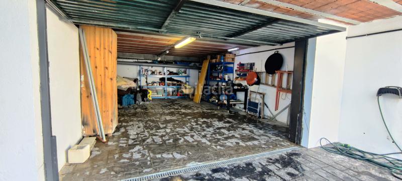 Foto f4c9eeb8-4cd4-4611-ace0-2876c3339865. Chalet with fireplace heating parking pool in costa Cunit - els jardins - els rosers Cunit