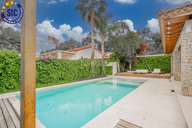 Foto 0a902a9b-b1cf-4e05-b7a0-2d5b53958335. Chalet con riscaldamento parcheggio piscina in La Cañada Paterna