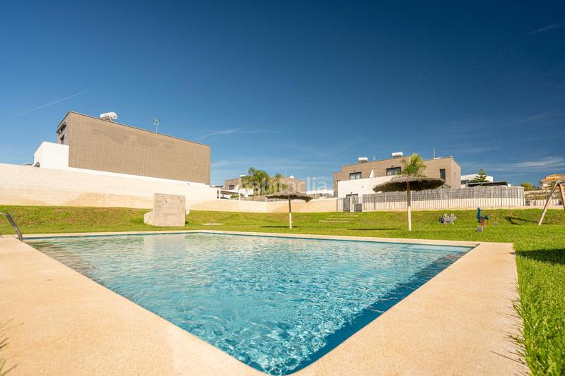 Foto 62249beb-8152-4d9a-b824-d7e19bcda3a2. Maison jumelée avec chauffage parking piscine dans San Antonio de Benagéber