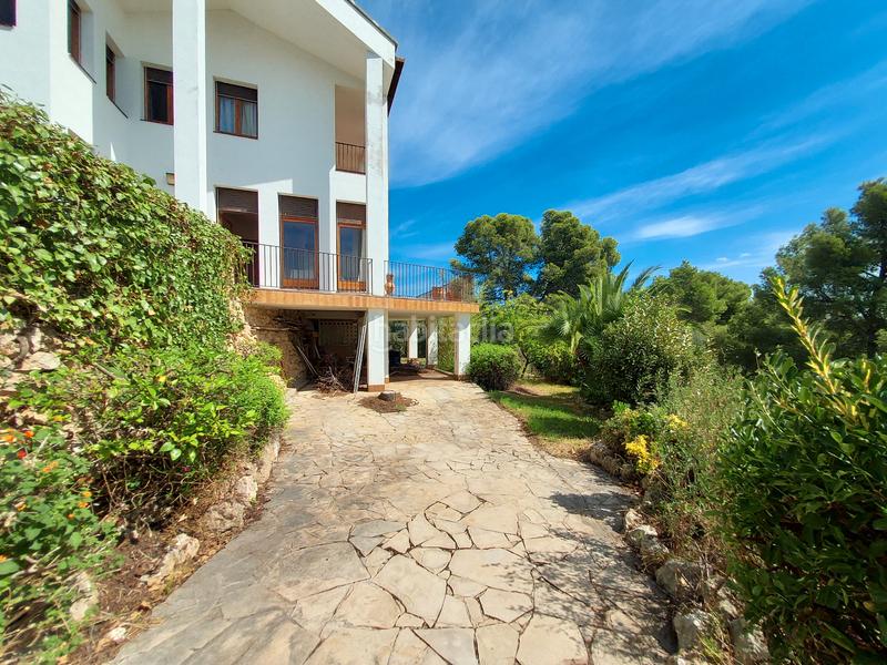 Foto c33d311d-332d-4183-89bd-fe35a2252dd2. Chalet con camino parcheggio in Els Masos - Els Garrofers Coma-ruga