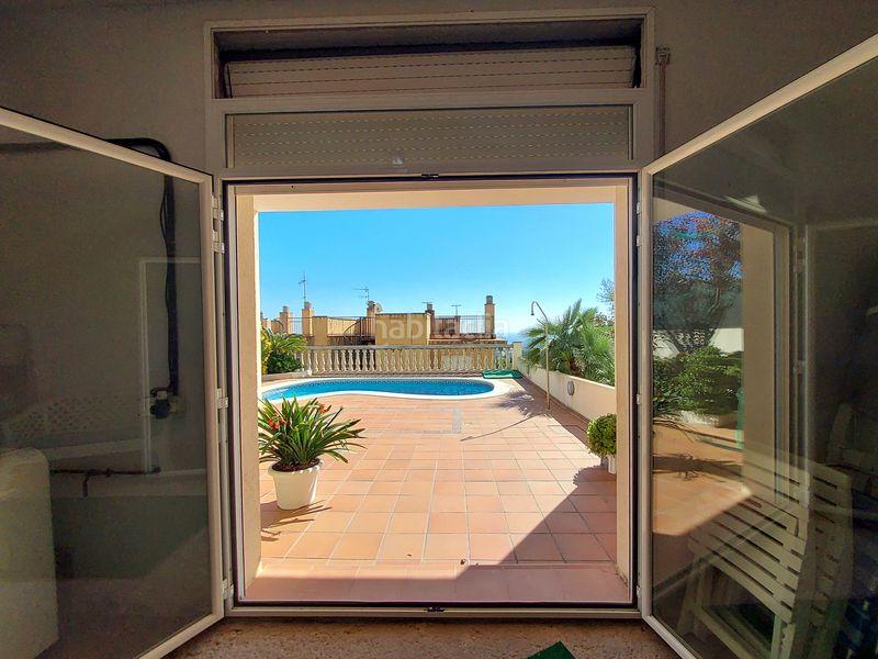 Foto 96d91dec-d4c6-4006-8a00-2ddfe54072fe. Casa aparellada amb xemeneia aparcament piscina a Coma-ruga
