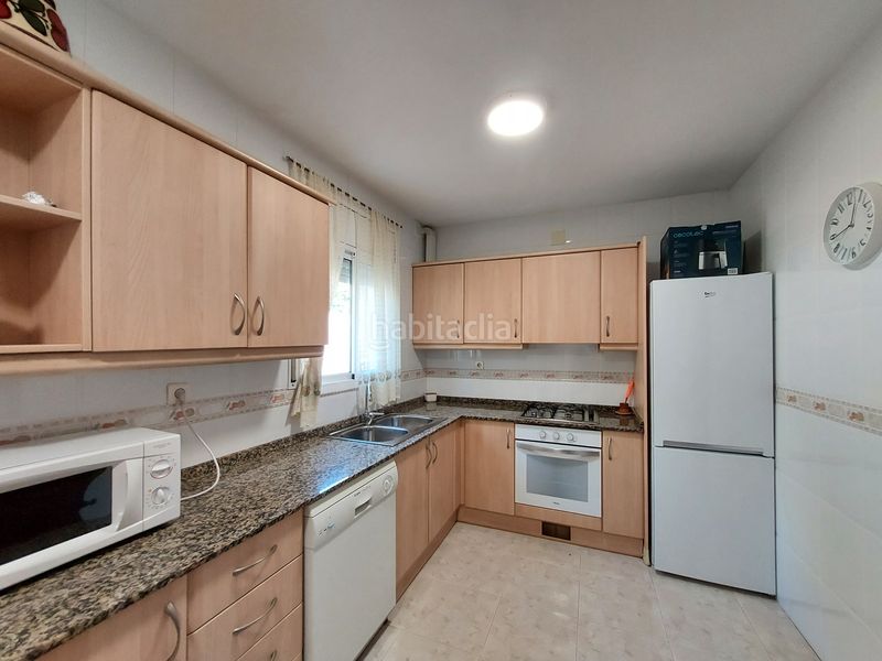 Foto c4eb243f-ee02-4741-867d-01a312fc8c41. Casa aparellada amb xemeneia aparcament piscina a Coma-ruga