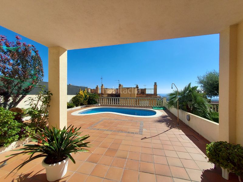 Foto cf6dd347-6122-4cb0-9f10-88eb442fd3f4. Casa aparellada amb xemeneia aparcament piscina a Coma-ruga