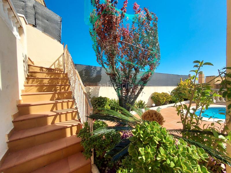 Foto 7b21f29d-5882-4859-be0e-51cba633268f. Maison jumelée avec cheminée parking piscine dans Els Masos - Els Garrofers Coma-ruga