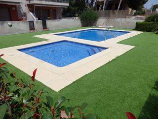 Erdgeschoss  Carrer de conca 5. Apartamento en planta baja de 2 hab. y 2 baños con parking.
