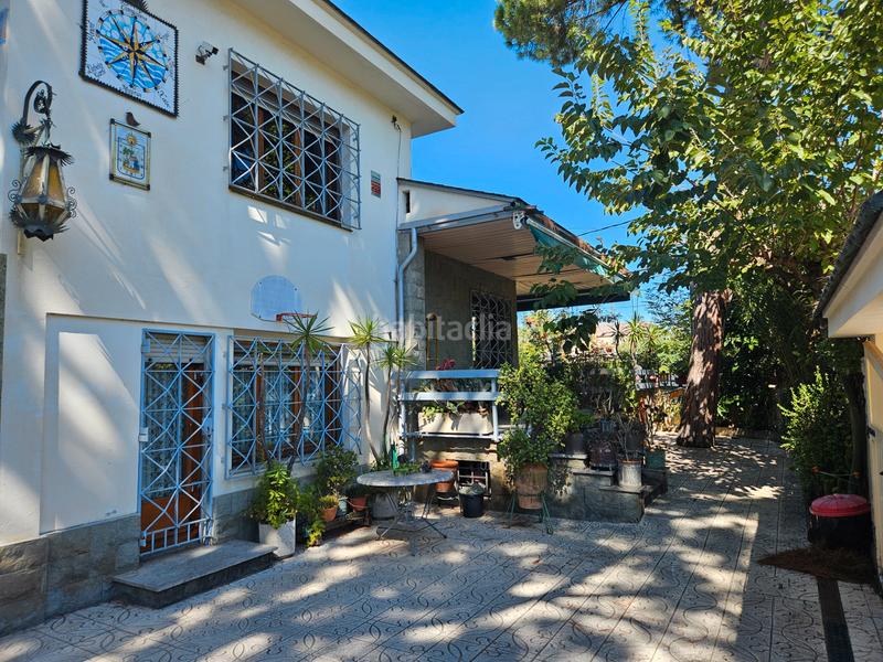 Foto d659c9d3-ca2a-422c-a6b9-9d5a9f0a3d6a. Chalet con camino riscaldamento parcheggio in Lluminetes Castelldefels