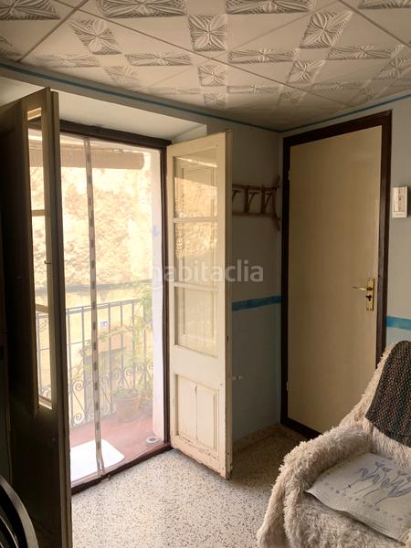 Foto 26bc1690-3087-4cde-96f4-16c1368a37ee. Casa adossada amb xemeneia a Perelló (El)