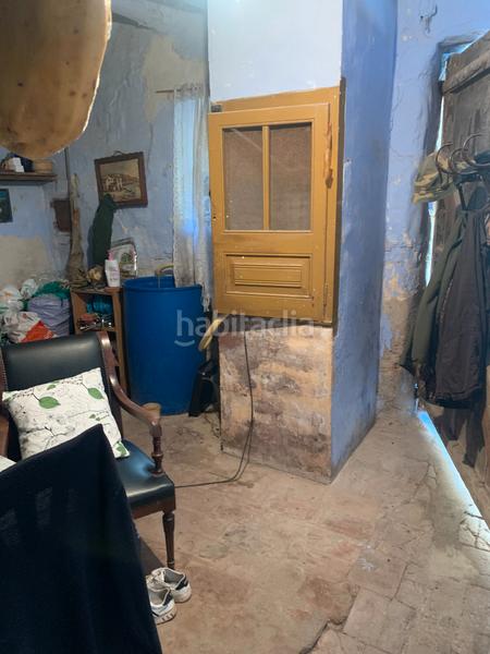 Foto 2a6301ba-bbe8-4af9-a24a-13d565dadf16. Casa adossada amb xemeneia a Perelló (El)