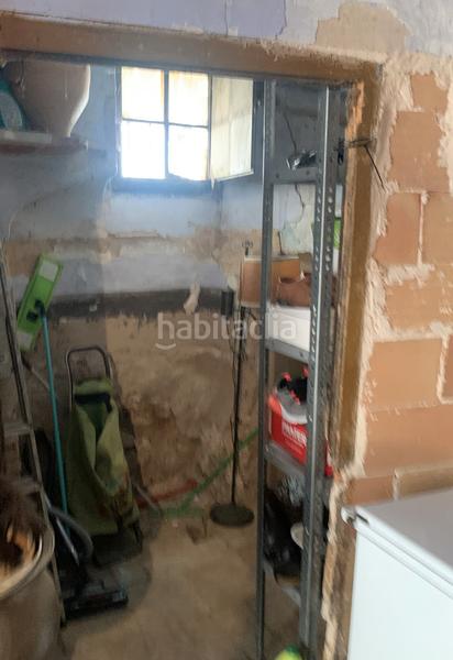 Foto 358b7e73-4700-42fd-b666-c163d3115e56. Casa adossada amb xemeneia a Perelló (El)