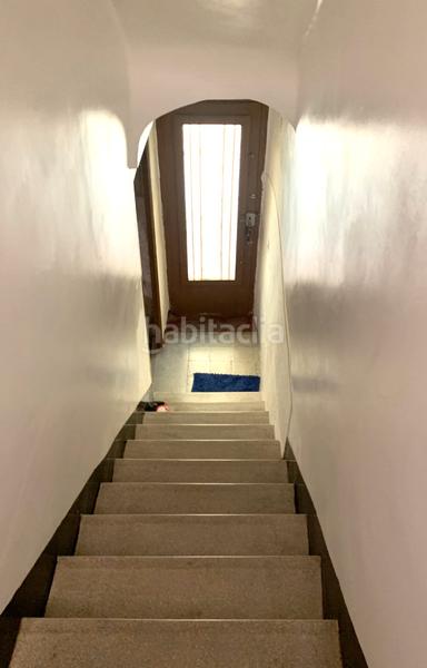 Foto 55e9c386-60d9-418e-9c3b-4460b1ffd66b. Casa adossada amb xemeneia a Perelló (El)