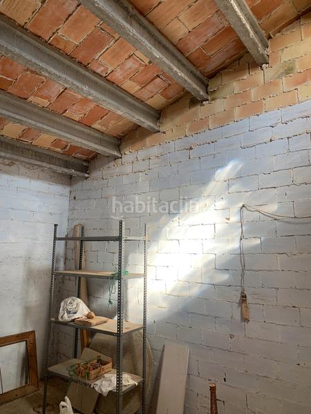 Foto 9719e506-40bb-49f4-abd0-cfe3fd62d2ef. Casa adossada amb xemeneia a Perelló (El)