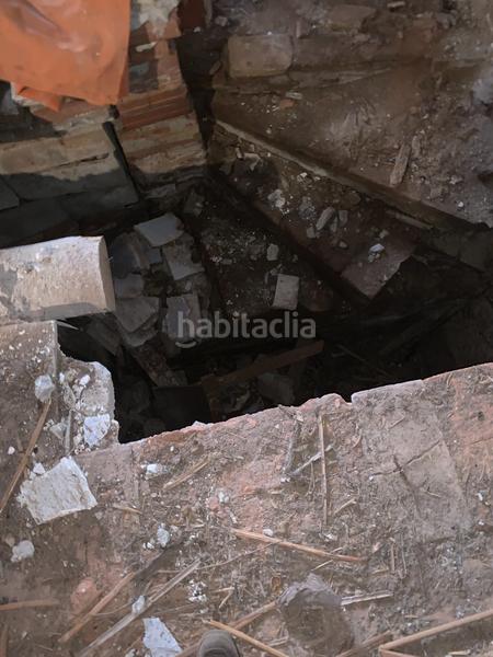 Foto ae5d1ef5-c0c4-4bcb-b69e-e7508dc8f828. Casa adossada amb xemeneia a Perelló (El)