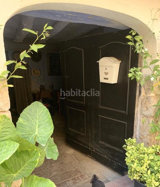 Foto cf6c054b-11ff-49fd-a7a9-0eee1b6f5625. Casa adossada amb xemeneia a Perelló (El)