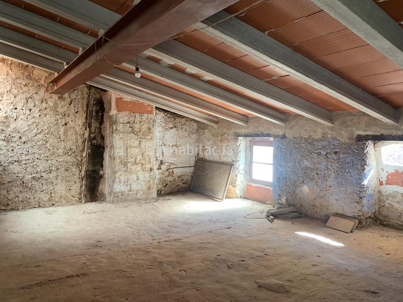 Foto f0a2c926-3291-414c-87f6-a8a04c9be709. Casa adossada amb xemeneia a Perelló (El)