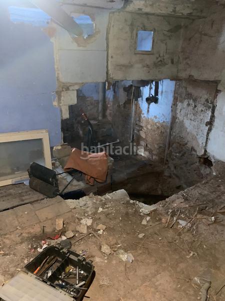 Foto f0e9d1bd-fcf7-44ce-aca7-0dfc44796c55. Casa adossada amb xemeneia a Perelló (El)