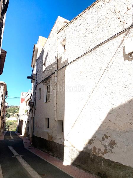 Foto f623b63b-16d7-4382-b4d2-e05da02f7bc9. Casa adossada amb xemeneia a Perelló (El)