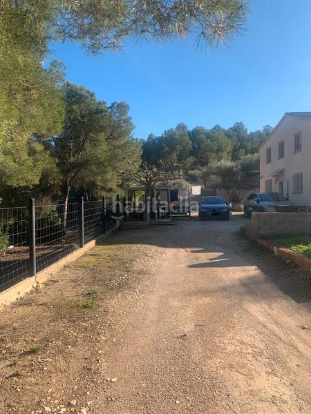 Foto ae66a4e8-9060-44e6-8992-8150e63ec559. Masia amb xemeneia a Perelló (El)