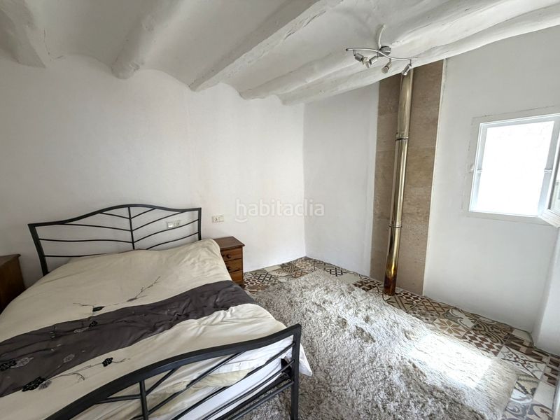 Foto 81b6a99d-b459-4e54-85cc-18700ac624a6. Casa adossada a Rasquera