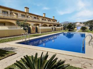 Casa adossada a N/a. Duplex con piscina comunitaria