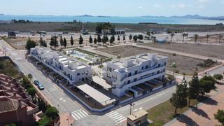 Etagenwohnung in Las Lomas de Rame-Bahía Bella. Impresionante apartamento de estilo ibicenco con vistas al mar y