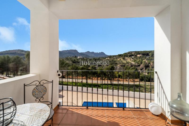 Foto f238c877-14d1-49a0-b0a1-679a6db9035c. Reihenhaus mit pool in La Empedrola Calp