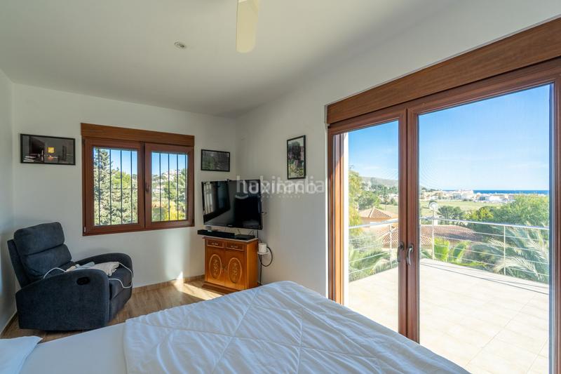 Foto 1aef17ae-f43c-4b66-811a-b083b8c22ed5. Chalet avec parking piscine dans Benimeit-Tabaira Moraira