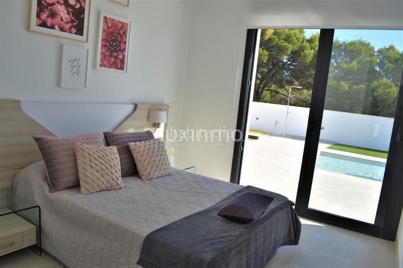 Foto 0fbb411d-8895-48d2-9e34-6f25e9926f2a. Casa pareada villa independiente rodeada de naturaleza con piscina privada en Nucia (la)