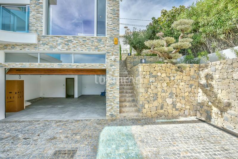 Foto a19e1687-10c4-446c-8a2b-368f82f5e7f8. Chalet avec chauffage parking piscine dans Canuta Calp