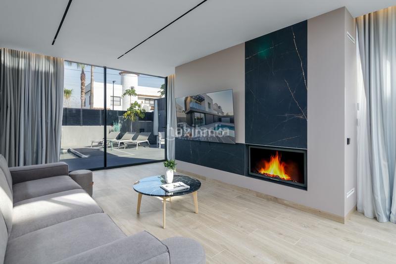 Foto f215cf52-c7a8-4cbc-bc5a-63687a50d144. Casa bifamiliare con riscaldamento piscina in L´Albir Alfàs del Pi (l´)