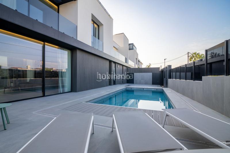 Foto f903116e-90c3-40ee-aafc-c4199c72dab8. Casa bifamiliare con riscaldamento piscina in L´Albir Alfàs del Pi (l´)