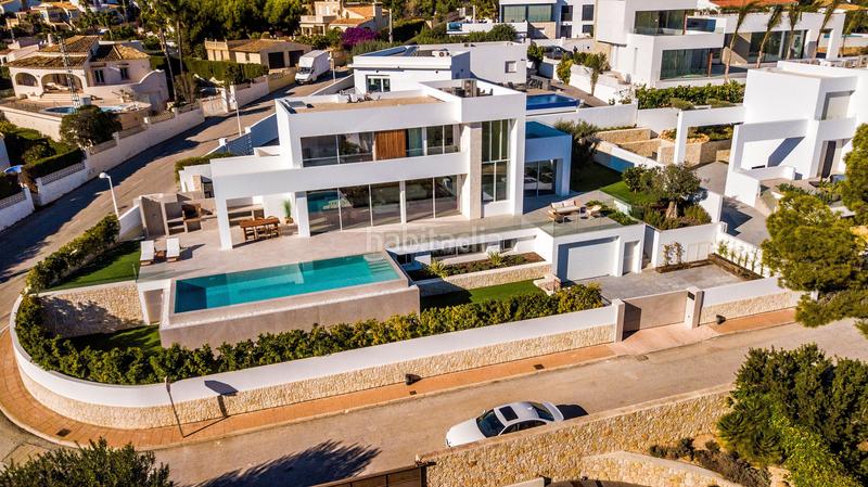 Foto 4b8b381b-cbd7-4493-89d1-a912c73de9a0. Chalet avec chauffage parking piscine dans La Fustera Benissa