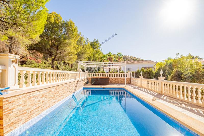 Foto e9dc13b9-d996-4c2c-9dd3-8c0b9828c431. Casa pareada encantadora villa mediterránea de 4 dormitorios en el albir con piscina privada y vistas a la montaña en Alfàs del Pi (l´)