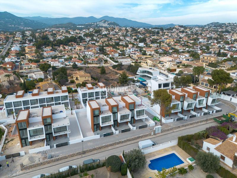 Foto 4ac2740f-7fdf-4899-a298-64da84b801ae. Casa aparellada amb calefacció aparcament piscina a Calp