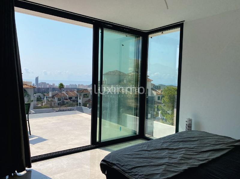 Foto 41cb3392-094f-434a-a17a-8bdb203ea9b4. Xalet amb calefacció aparcament piscina a Golf Bahía Finestrat