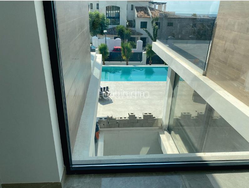 Foto c30e0d36-f873-4167-bf7f-f3a728272794. Xalet amb calefacció aparcament piscina a Golf Bahía Finestrat