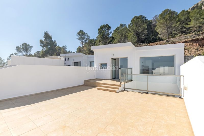 Foto 3b108d7c-c95a-4a56-af49-81b167c4f0b1. Casa aparellada amb aparcament piscina a Oltamar - Cucarres Calp
