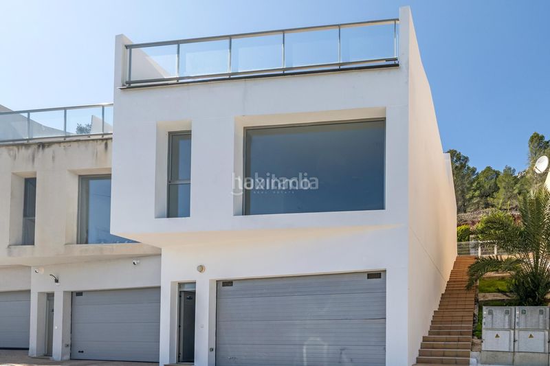 Foto cb41f571-d094-4bad-8eb8-b6fa800ff7db. Casa aparellada amb aparcament piscina a Oltamar - Cucarres Calp