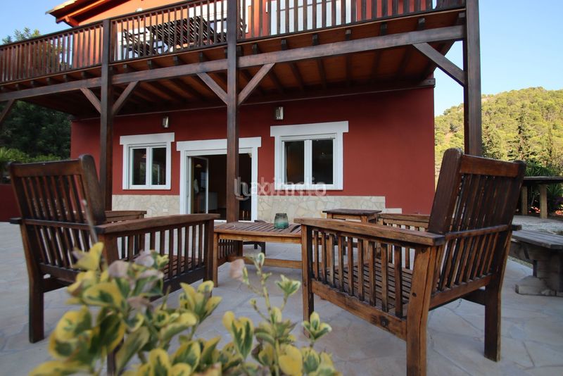 Foto fd70c0cc-f4de-4004-9eea-3957323aecc7. Chalet se vende una finca y dos cabañas de madera en Finestrat