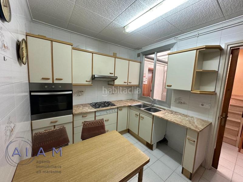 Foto afdd71e8-6ddb-4144-b835-536c2a995585. Casa  y local comercial en el centro en Tordera Tordera